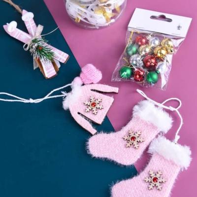 China Small Pink Wooden Christmas Stocking Ornament Christmas Tree Pendant Christmas Tree Ornaments for sale