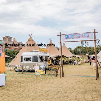 China 2022 Large Space Hot Selling Big Space Indian Luxury Solid Wood Pole Camping Tent Teepee Outdoor Tent for sale