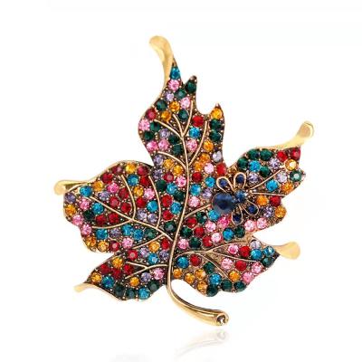 China Luxury Elegant Women Pintassel Leaf Dangle Brooches Crystal Metal Huge Vintage Saree Stone Crystal Hoja Brooch Muslim Flower for sale