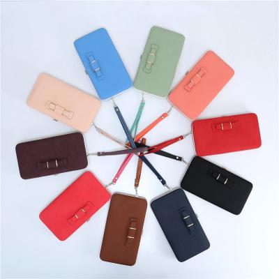 China Soft Women Anti-theft Freeze Purse Girls Cute Smart Wallet Mobile Phone Bags For Women for sale