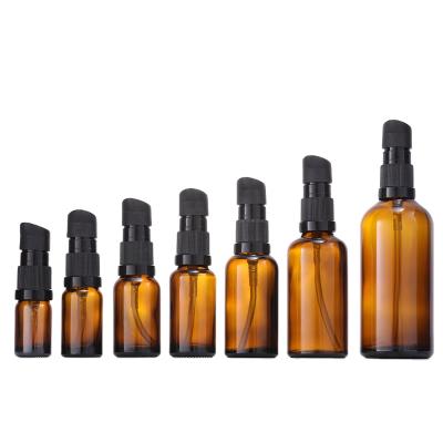 China Cosmetic Customs 5ml 15ml 20ml 30ml 50ml 100ml With Treatment Pump Glass Bottles for sale