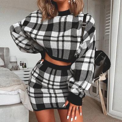 China CaiNan custom made sexy long-sleeved fashion short skirt anti-static knitted jumper dress plaid knitted autumn woman two-piece sweater dress for sale