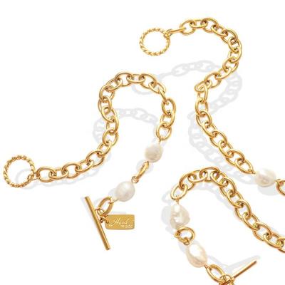 China Environmentally Friendly Minimalism Women OT Button Gold Plated Stainless Steel Chain Bracelet Freshwater Baroque Bracelet With Pearls for sale