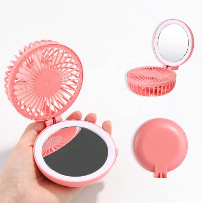 China Beautiful Personalized Portable Travel LED Makeup Mirror With Fan Pink LED Light Multifunctional Handheld Cosmetic Mirror With Fan for sale