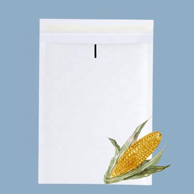 China Compostable Kraft White Paper Logo Cushion Strong Adhesive Bubble Mailing Ad for sale