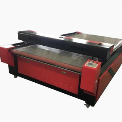 China HTY-1625 Automated Loading Auto Feeding Laser Cutting Machine for Clothing Curtain Lace Fabric and Leather Laser Cutter for sale