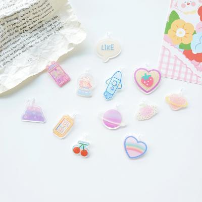 China Eco-Friendly Outer Space Series Acrylic Charms Cloud Spaceship Planet Shooting Star Slice Beads For Earrings Keys Scrapbook Chain Accessories for sale