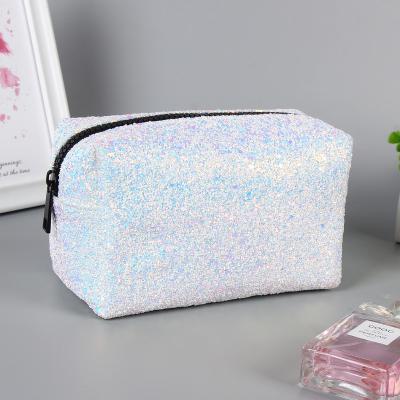 China Cheap Factory Price Fashion Simple Design Glitter Hardware Zipper Closure Pouch Luxury Cosmetic Bag Women Travel Makeup Bag for sale