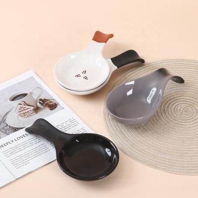 China Ceramic Kitchen Spoon Rest Porcelain Pocket Spoon Holder Durable Kitchen Cookware Rest For Stove Top for sale