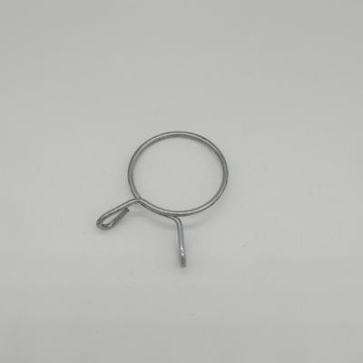 China Spiral Round Circular Types Wire Frames Metal Tension Push Spring Clip for sale