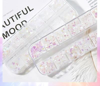 China Nail Charms 2021 Candy Paper Shard Shaped Cellophane Shaped Cellophane Nail Sticker Love Heart Star Moon Nail Butterfly Decoration for sale