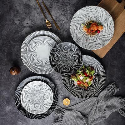 China Sustainable Wholesale Restaurant Serving Black And White Round Salad Dessert Dinner Dishes Sets Tableware Plates Ceramic Plates for sale