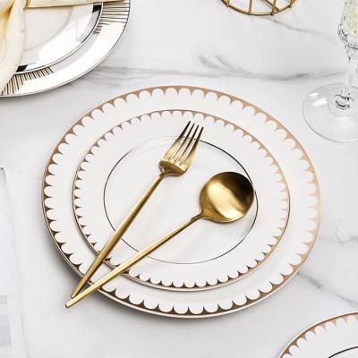 China Viable High Quality Decal Printed Wedding Used Dinner Luxury Round White Gold Ceramic Charger Dish For Food for sale