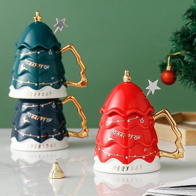 China Gift Set Viable Popular Christmas Trees Shape Luxury Shiny Elegant Coffee Gold Luster Christmas Ceramic Mugs With Star Spoon for sale