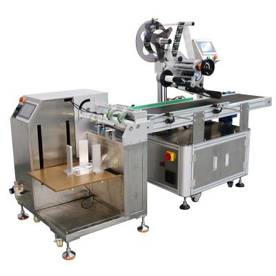 China Thin Plastic Bag/Card Labeling Machine with Vacuum Feeder and Catcher Commodity Packaging for sale