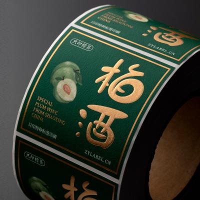 China Plum Wine Product Roll Self Logo Embossed Foil Textured Scratch Paper Custom Adhesive Label Sticker for sale