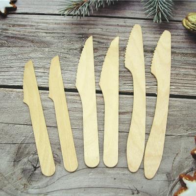 China Wooden biodegradable disposable wooden cutlery with napkin for sale