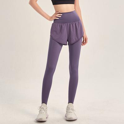 China Breathable Quick Dry Fitness Golf Two Piece Loose Sports Pants High Waist Pockets Gaiters Tight Yoga Pants For Women for sale