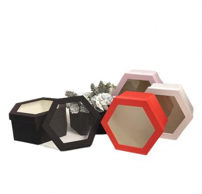 China Recycled Materials Spots Tined Cloth Hexagonal Two-Piece Window Opening High-Grade Flower Gift Box Special-Shaped Hand Gift Box for sale