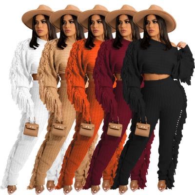 China Breathable Winter Two Piece Sweaters Tops Thick Outfits Turtle Neck Sets Women Tassels Pullover Fringe Two Piece Pants Suits Sweated Sets for sale