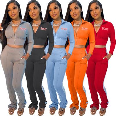 China Breathable 2021 Women Fashion Tracksuits Two Piece Outfits Crop Tops Workout Clothes Fall 2 Piece Stacked Pant Set Slim Tracksuits Clothing for sale