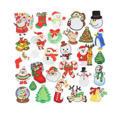 China Handmade Full Color Custom Sew On Mini Self Adhesive Patches Christmas Theme Embroidery Patches For Jackets for sale