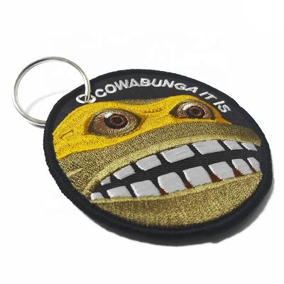 China Wholesale Custom High Quality Round Shape Two Sides Frog Pattern Embroidered Key Chain for sale