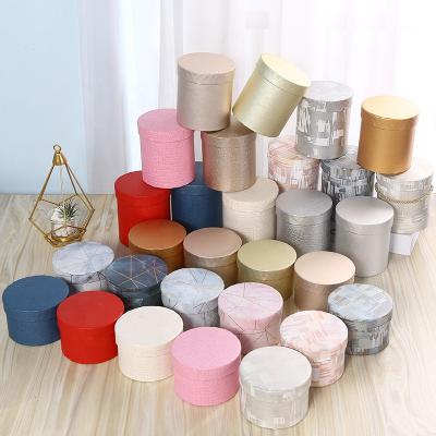 China Luxury Round Rose Flower Paper Biodegradable Gift Tube Bouquet Cylinder Cardboard Tube for sale