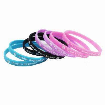 China Plastic Wristbands Logo On Vinyl Silicone Wristband custom silicone factory direct sale multi colors cheap price CLASSIC for sale