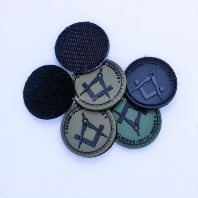 China Lowest Price PVC 3D Custom Soft Rubber Patch Viable Logo Round Patch With Hook And Loop For Hat And Bag for sale