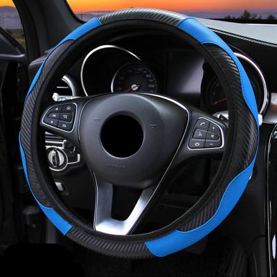 China Breathable Decoration Slip PU 37-38Cm Auto Fit Perfect Fit Anti Slip Leather No Ring Elastic Band Carbon Fiber Interior Steering Wheel Cover for sale