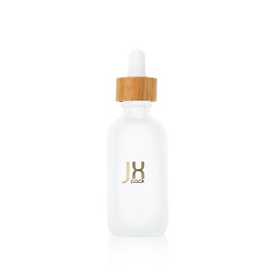 China New Cosmetic Custom Logo 60ml White Glass Dropper Bottle Frosted Essential Oil Glass Bottle With Bamboo Cap for sale