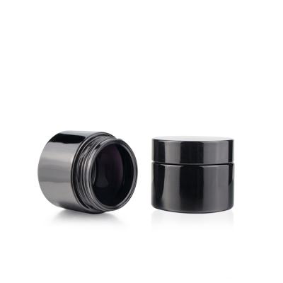 China Wholesale Screw Mouth Heavy Duty Glass Food Jar Weed Storage Jars Wholesale Wide Glass Black Child Weed Pot With Flat Surface Lid for sale