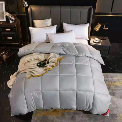 China Home Top Selling Microfiber Polyester Fabric Hotel Bed Filling Embossing Comforters Quilting for sale