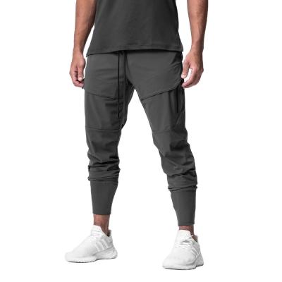 China Breathable New arrival autumn casual trousers solid pocket sports pants for men for sale