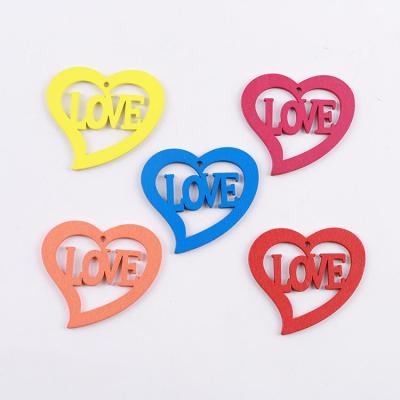 China Eco-friendly 50 pieces/bag Natural Heart Wooden Love Confetti Decorating Wedding Crafts Decorating Chip Card Making Scrapbook 35x40MM for sale