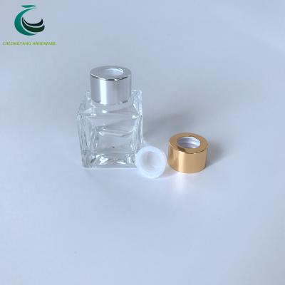 China Non Spill Glossy Gold Colored Aluminum Tubular Diffuser Cap For Perfume for sale