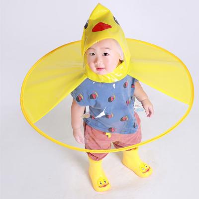 China Bachelor Raincoat Clothes Hat Kids Raincoat Cute Duck Rain Gear Cute UFO Rain Coat Children Umbrella Hat for sale