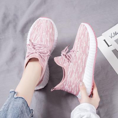 China 2022 Fashion Trend New Arrival Fly Knit Running Sports Shoes For Women Mesh Walking Style Shoes Ladies Casual Sneakers for sale