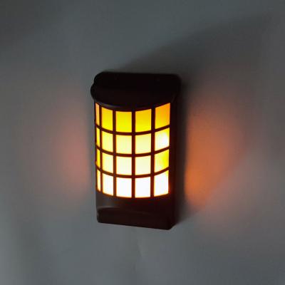 China Warm White Waterproof Garden Flame 60 LED Wall Lamp Outdoor Solar Garden Decoration Light for sale