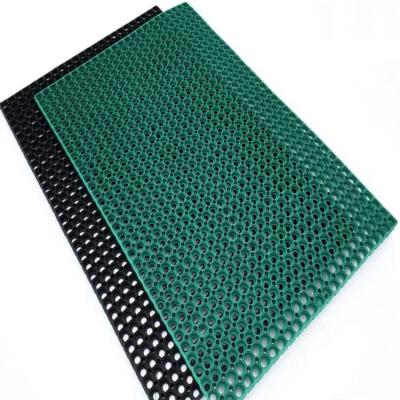 China Washable Anti Fatigue Safety Outdoor Playground Grass Grow Water Garden Rubber Mat With Holes for sale