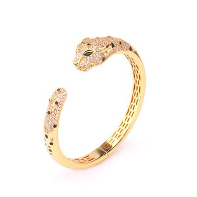 China Amazon Fashion Hot Sale Environmentally Friendly Women's Real Leopard Head 18K Gold Plated Micro Paved Zircon Bangle Opening Cuff Adjustable Bangle for sale