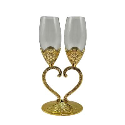 China Wedding Decoration Sustainable Wedding Gold Plated Champagne Glass In Turkish Flower Double Love Shaped Heart Shaped Champagne Glass for sale