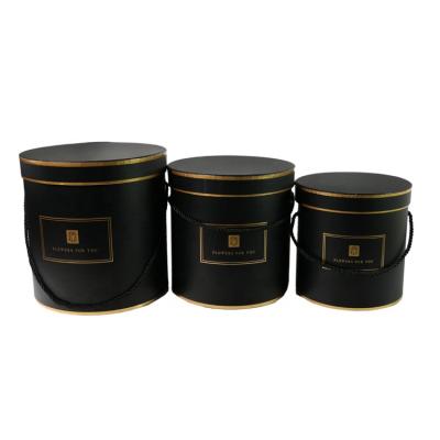 China 3pcs Recyclable Set Round Gift Flower Hat Box Cardboard Round Flower Box With Handle for sale