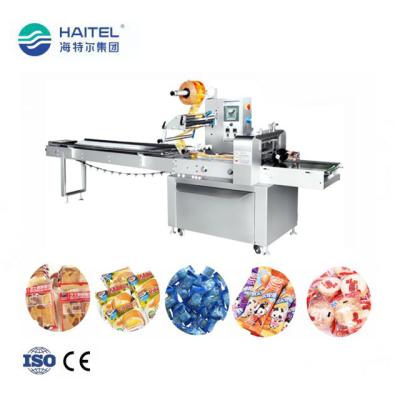 China Haitel Cutting And Wrapping Wrap Pillow Package Packing Machine CE ISO Certified for sale