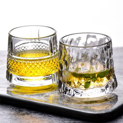 China Crystal Whiskey Glasses Rotatable Old Current Shaped Rocks Bar Glass Tumbler Glass for Drinking for sale