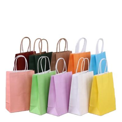 China Recyclable Wholesale Cheap Price Kraft Paper Shopping Gift Bag For Packaging for sale