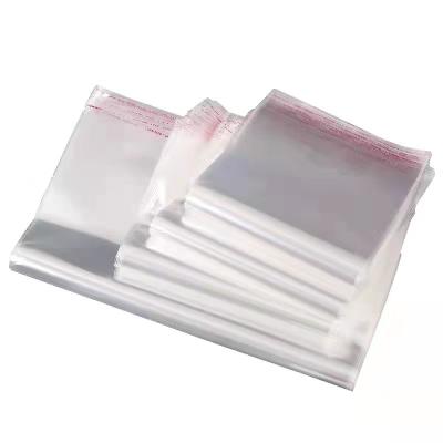 China Recyclable Wholesale Cheap Clear Self Adhesive Seal Clothes Packing Opp Plastic Bag for sale