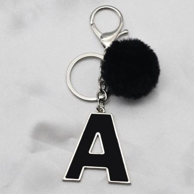 China 2021 Alloy Car Ball Fur Black Key Chain Ring Key Chain 26 Letters Women Luxury Drip Oil Drip Key Chain For Gift for sale