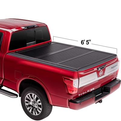 China Nissan 6.5ft Hard Triple Fold Bedspread Titan Pickup Truck Tailbox Waterproof Pickup Truck Bed Covers for sale